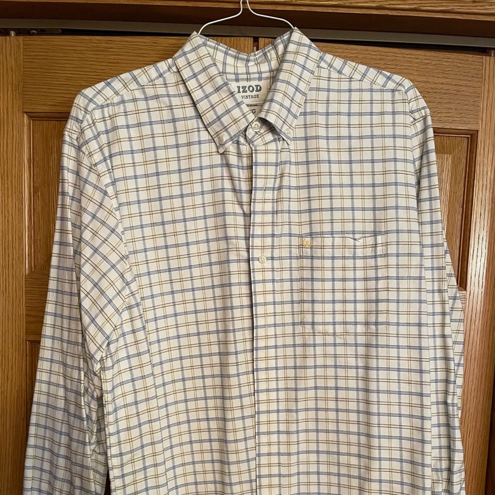 Freshly cleaned Izod button down. Cream/blue/yellow with button down collar.